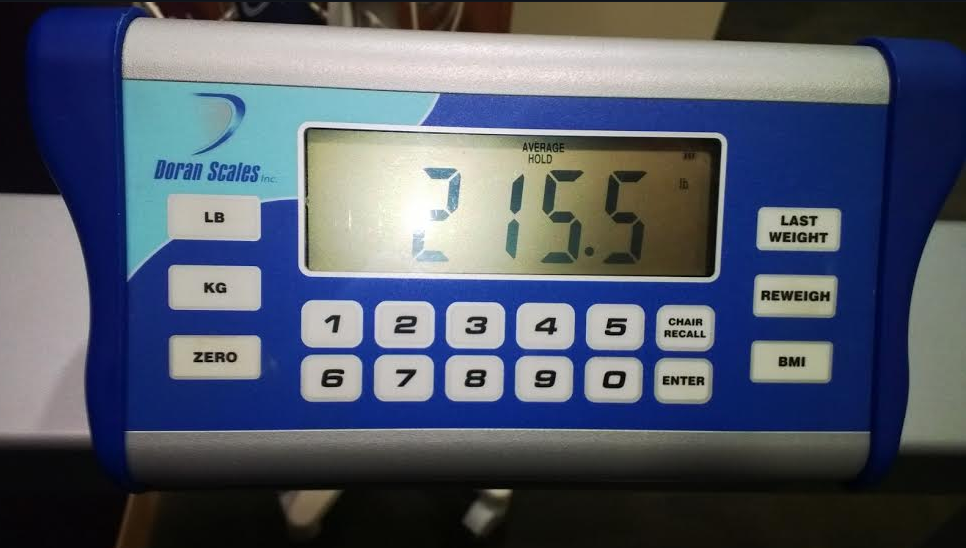 Actual pic of my doctor's scale with my weight from yesterday! I love phone cameras.
